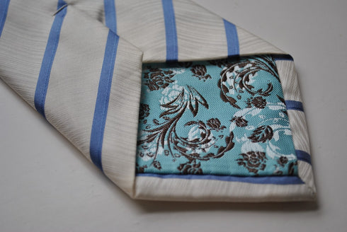 ivory tie with blue club stripes